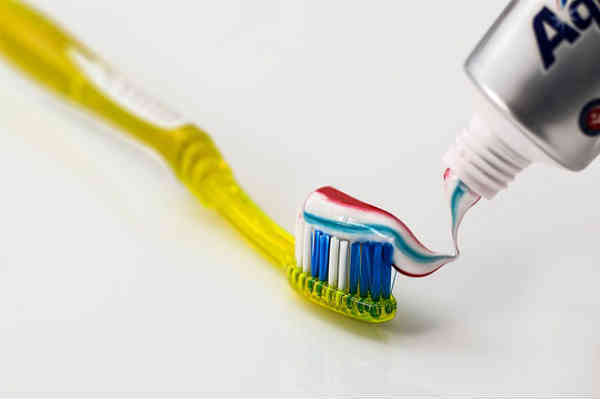 paste spread on a toothbrush